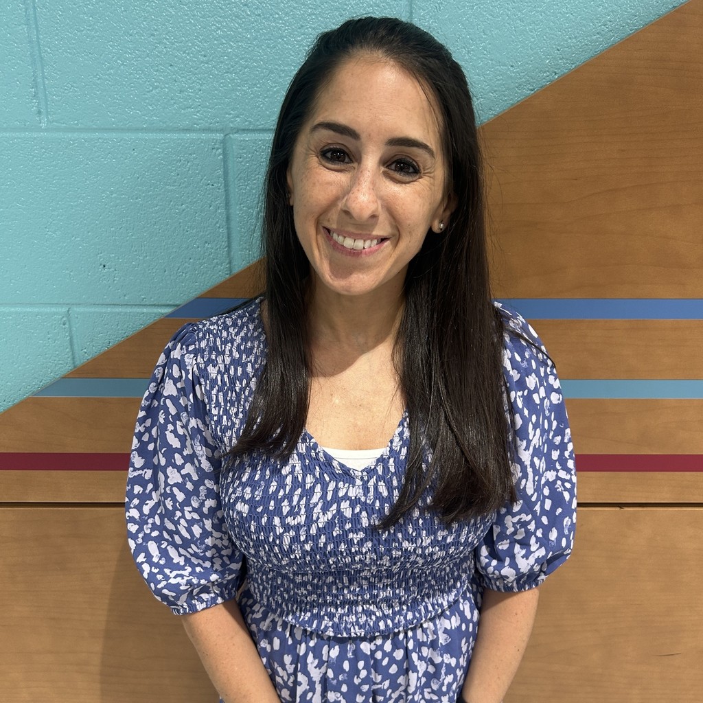 Photo of Ms. Zacks- Media Specialist standing in hallway