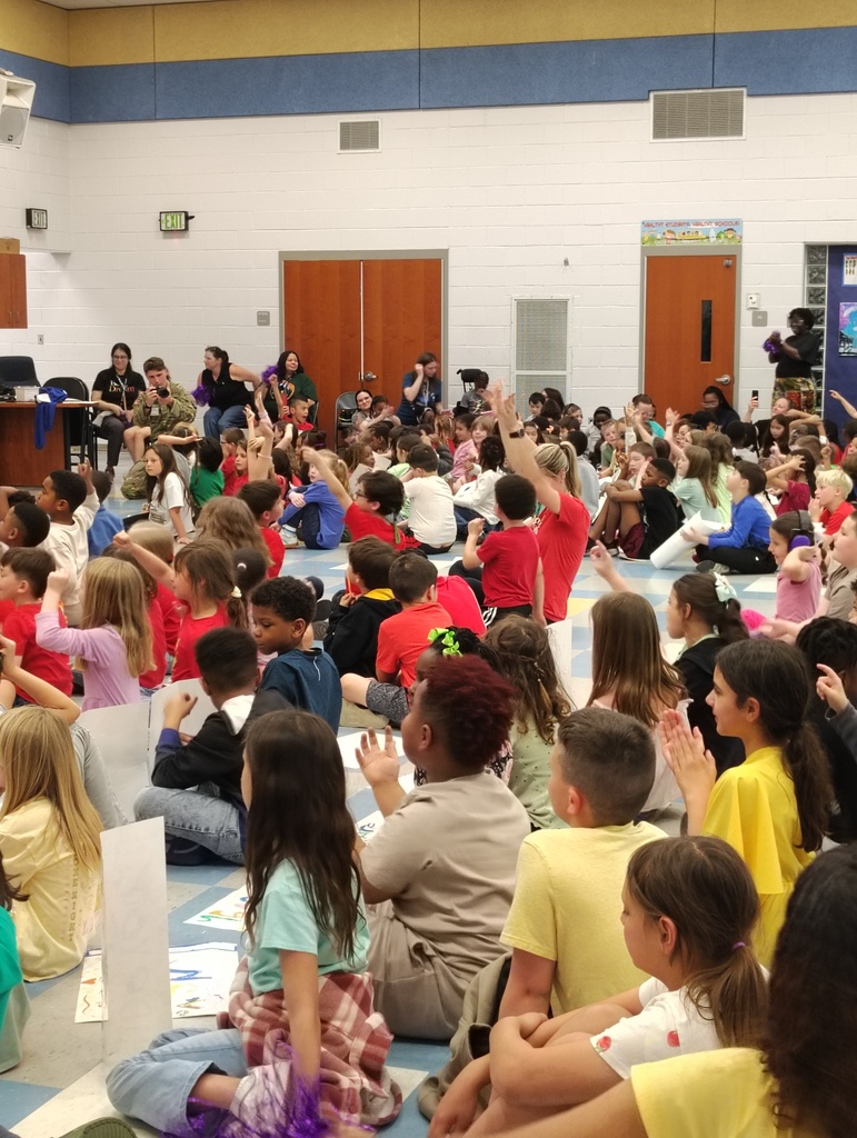 students sitting and cheering