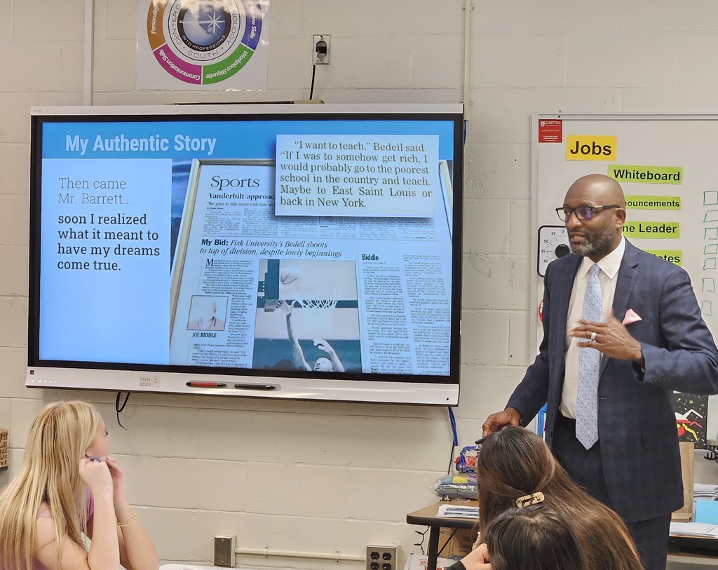 Dr. Bedell speaks to students in a classroom