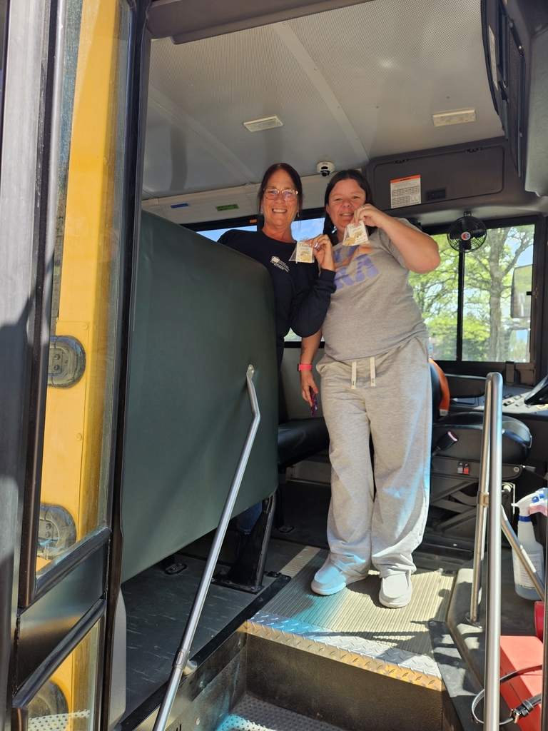 two female bus drivers on bus