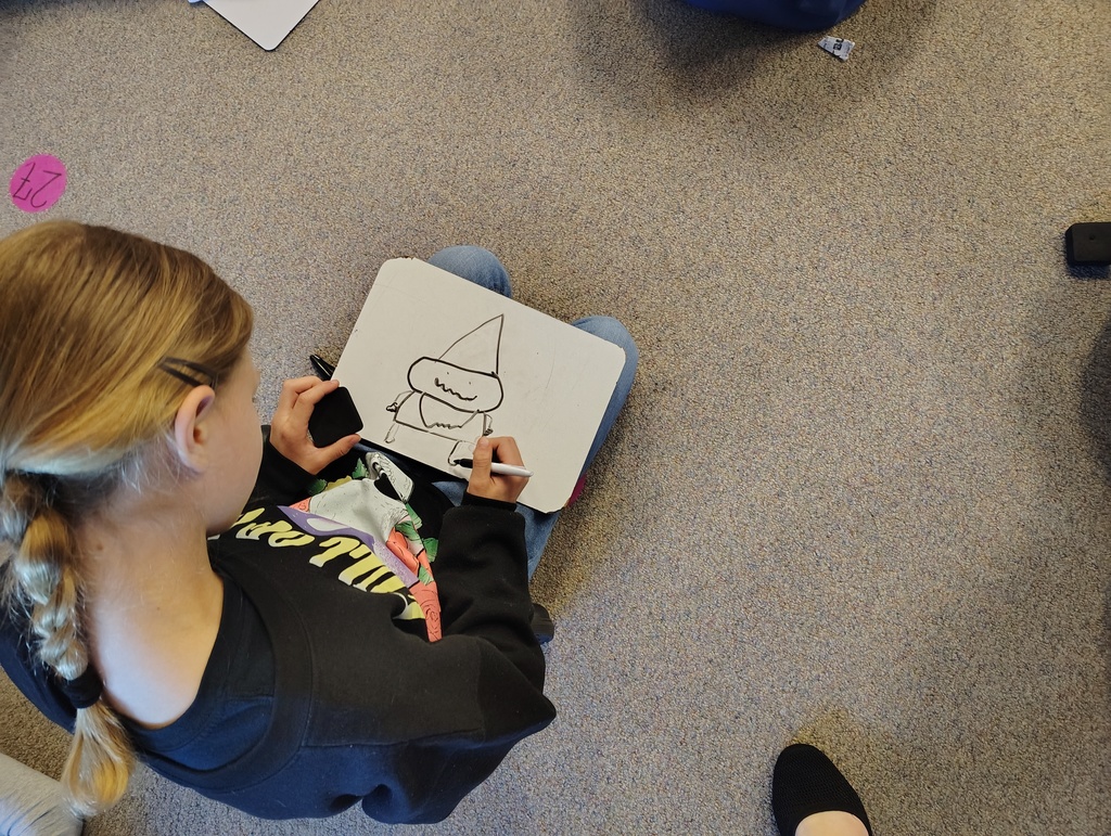 student drawing a gnome