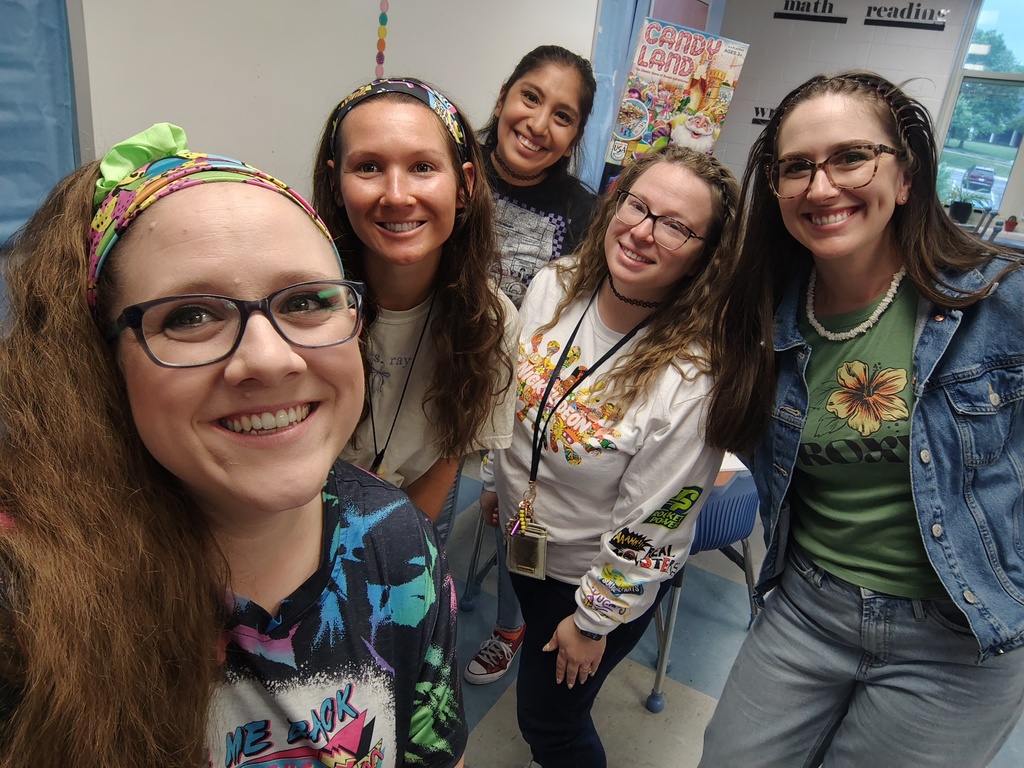 A group of teachers rocking 90s gear