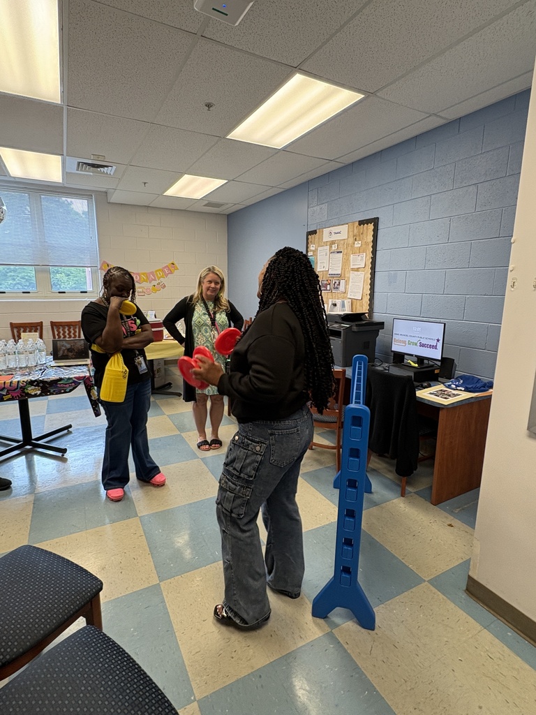 Ms. Hardy and Ms. Johnson playing a serious game of Connect Four
