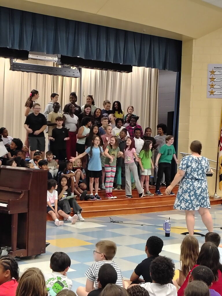 chorus singers and their director