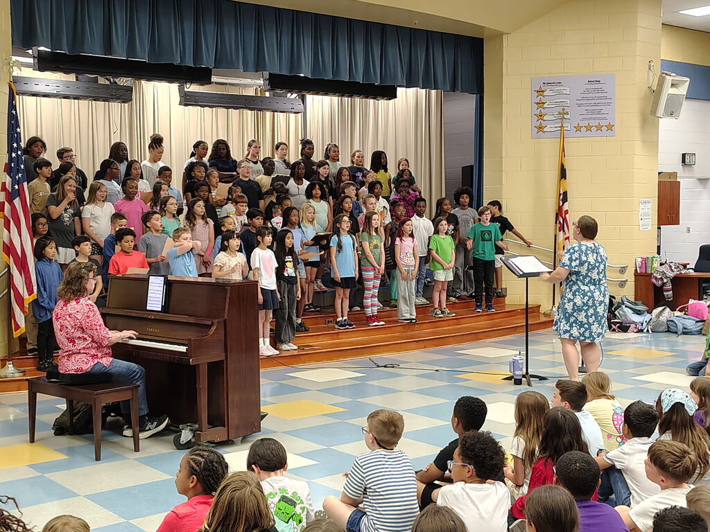 chorus singers and their director
