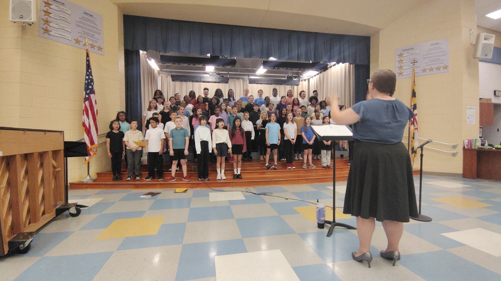 chorus singers and their director