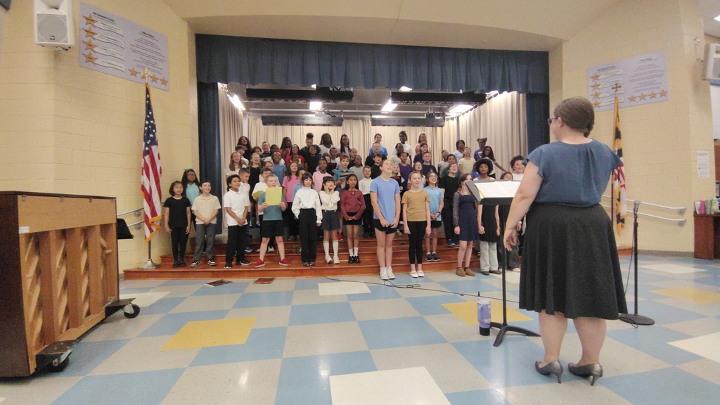 chorus singers and their director