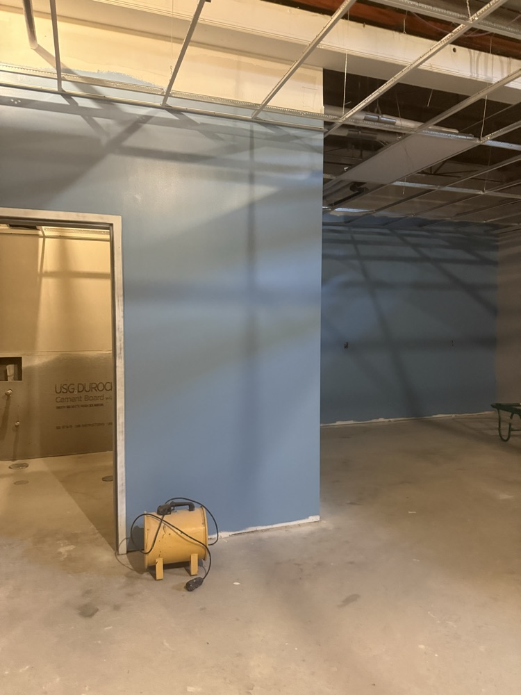 resource room under construction with blue paint