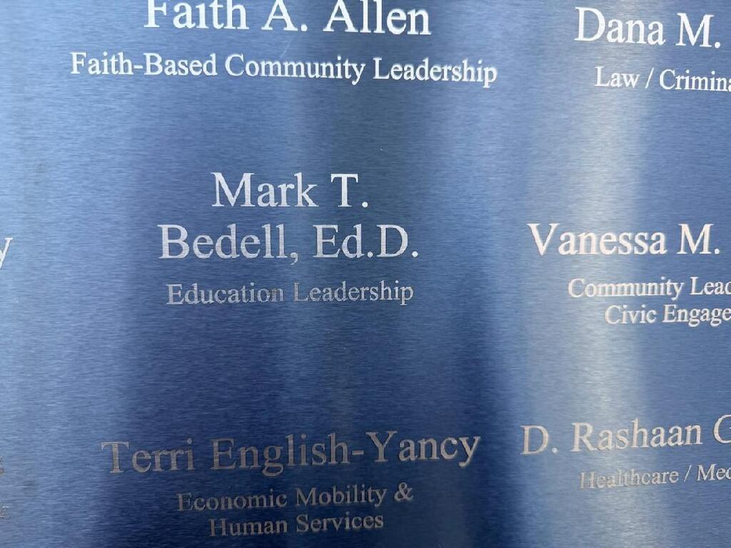 Closeup of Dr. Bedell's name on monument wall