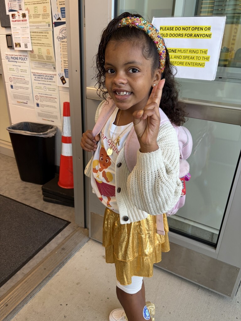 Photo of student wearing gold for childhood cancer awareness