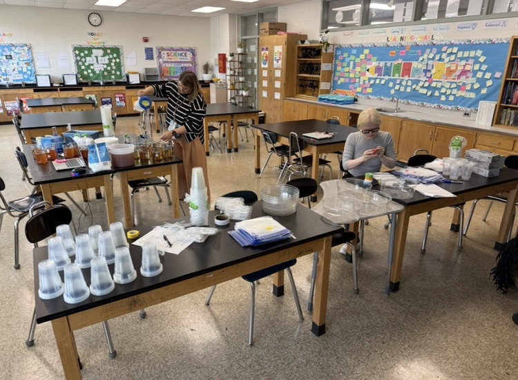 teachers prepping the lab