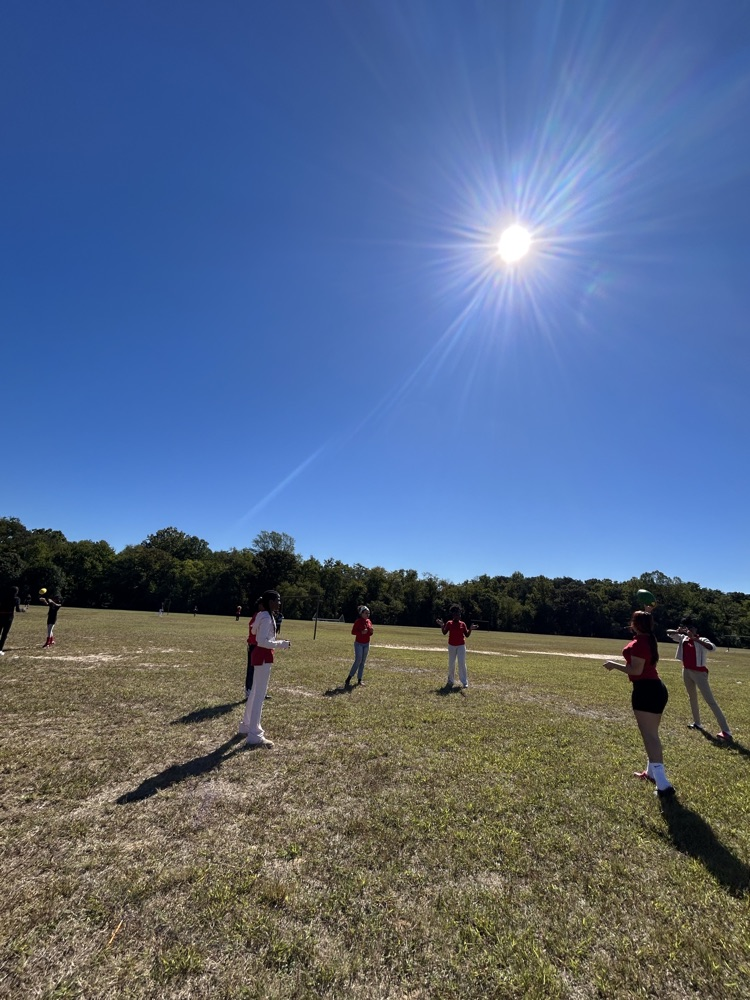 students playing football