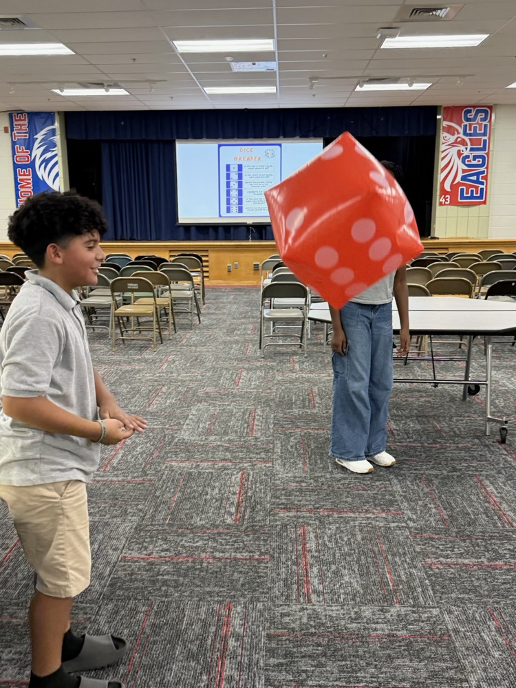 students tossing dice