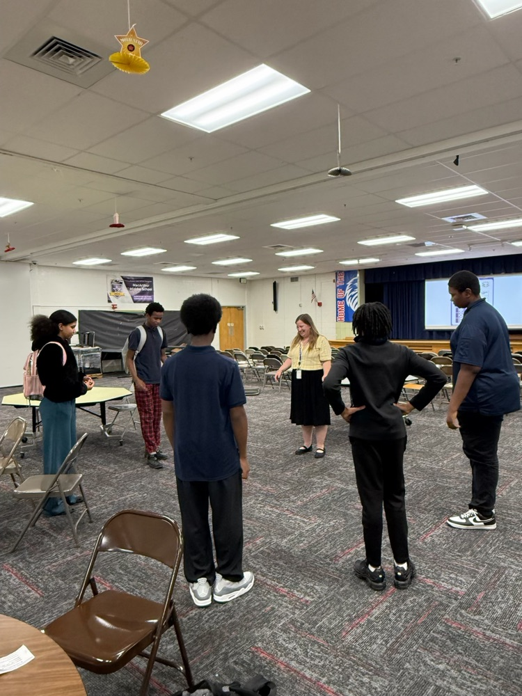 students tossing dice