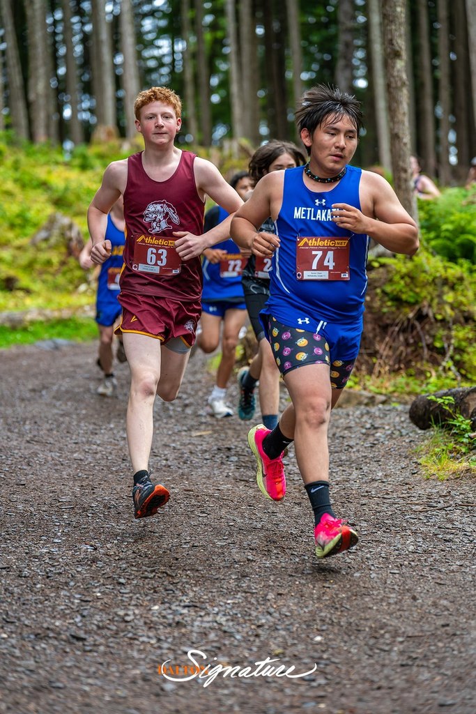 students running in cross country race