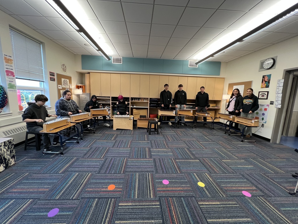 students standing with xylophones