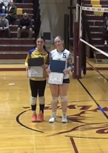 students holding awards