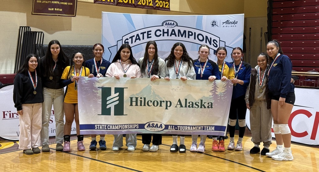 students holding banner