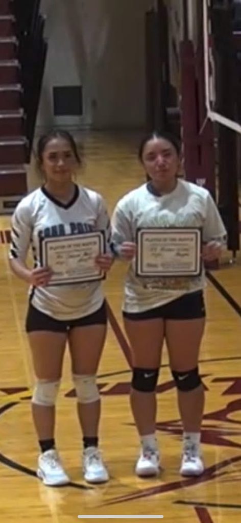 students holding awards