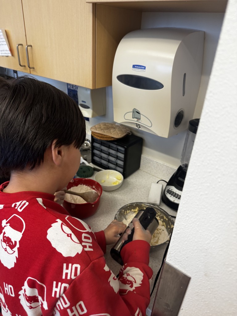 students making holiday cookies