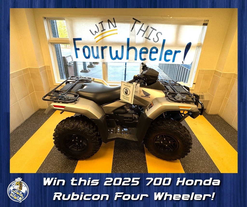 4wheeler in building with sign