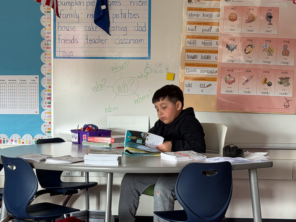 student reading in classroom