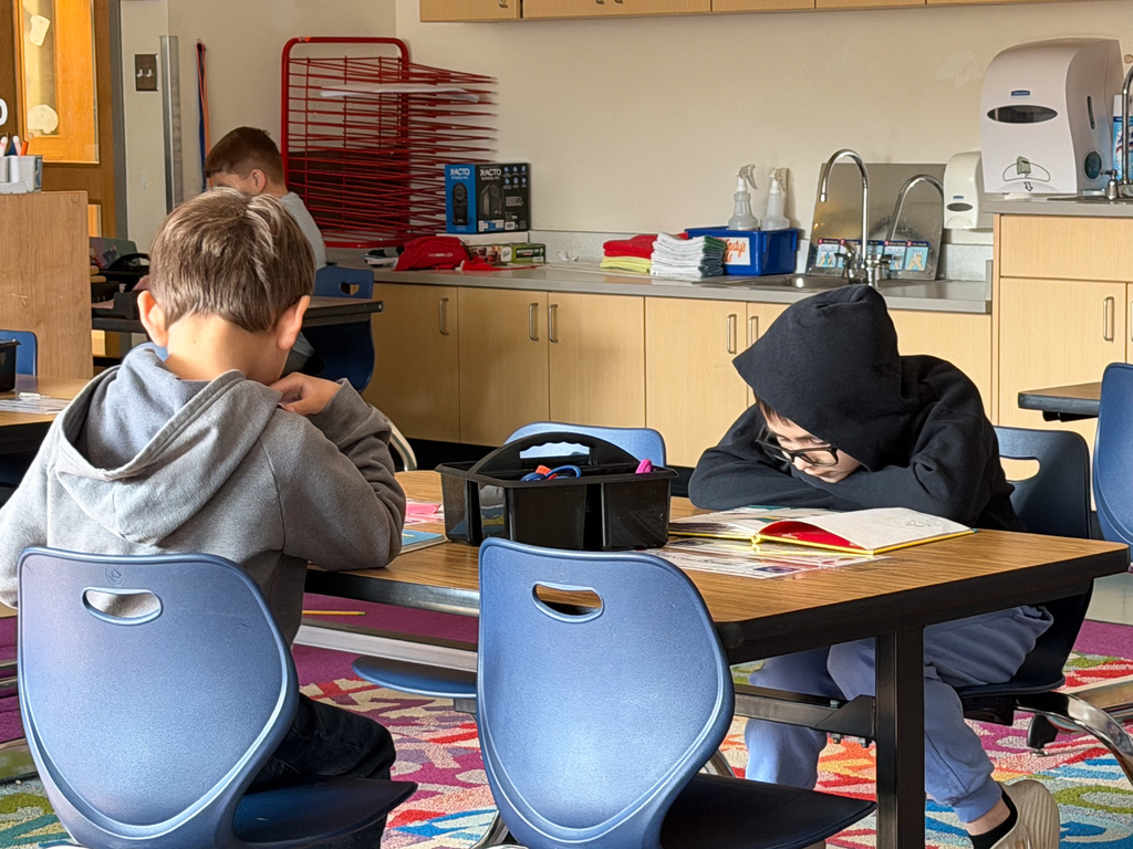 student reading in classroom
