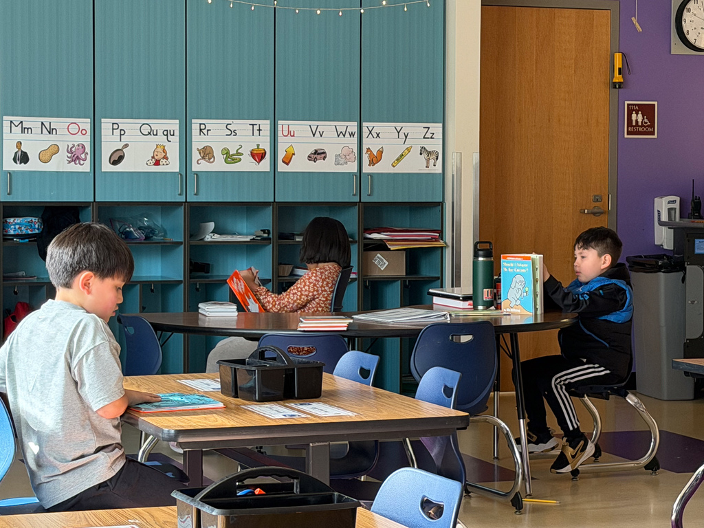 student reading in classroom