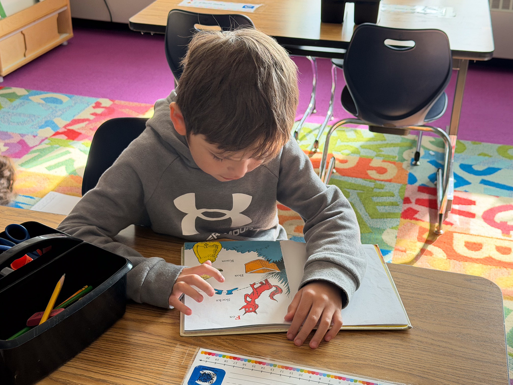 student reading in classroom