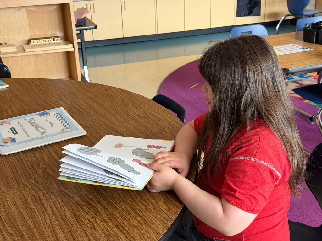 student reading in classroom