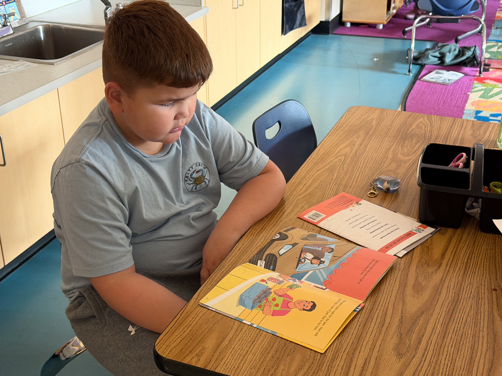 student reading in classroom