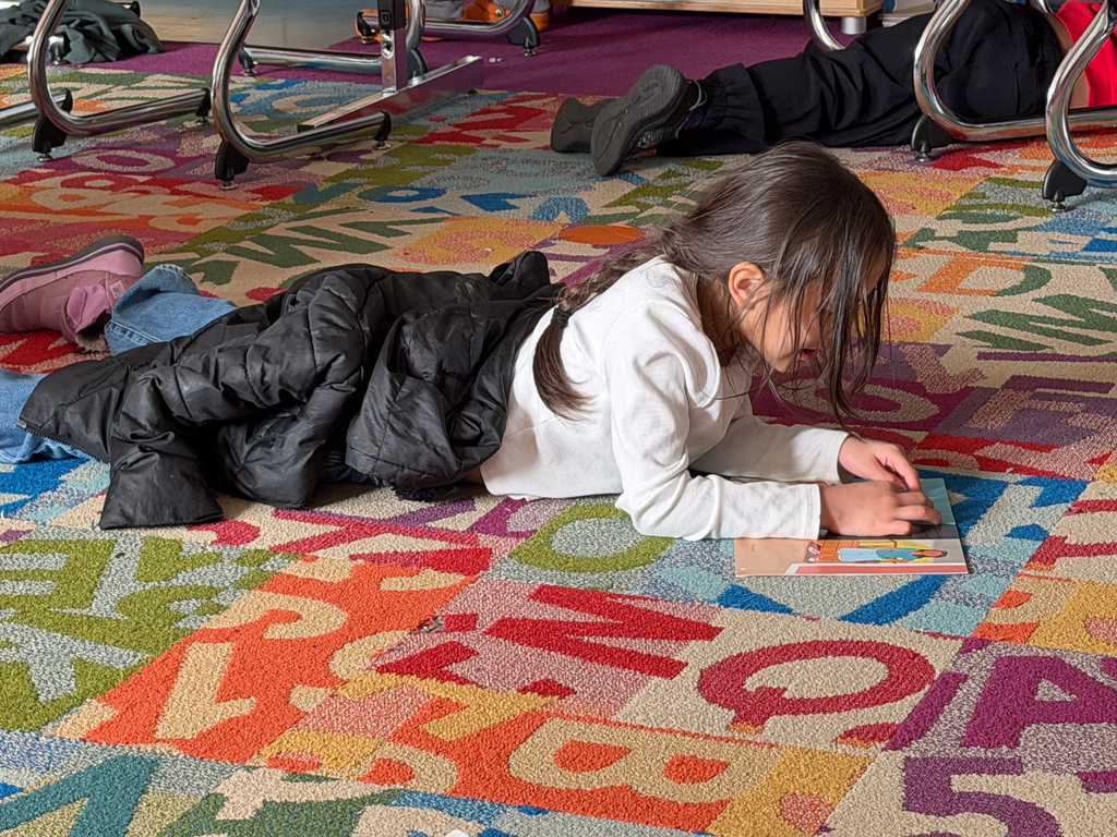 student reading in classroom