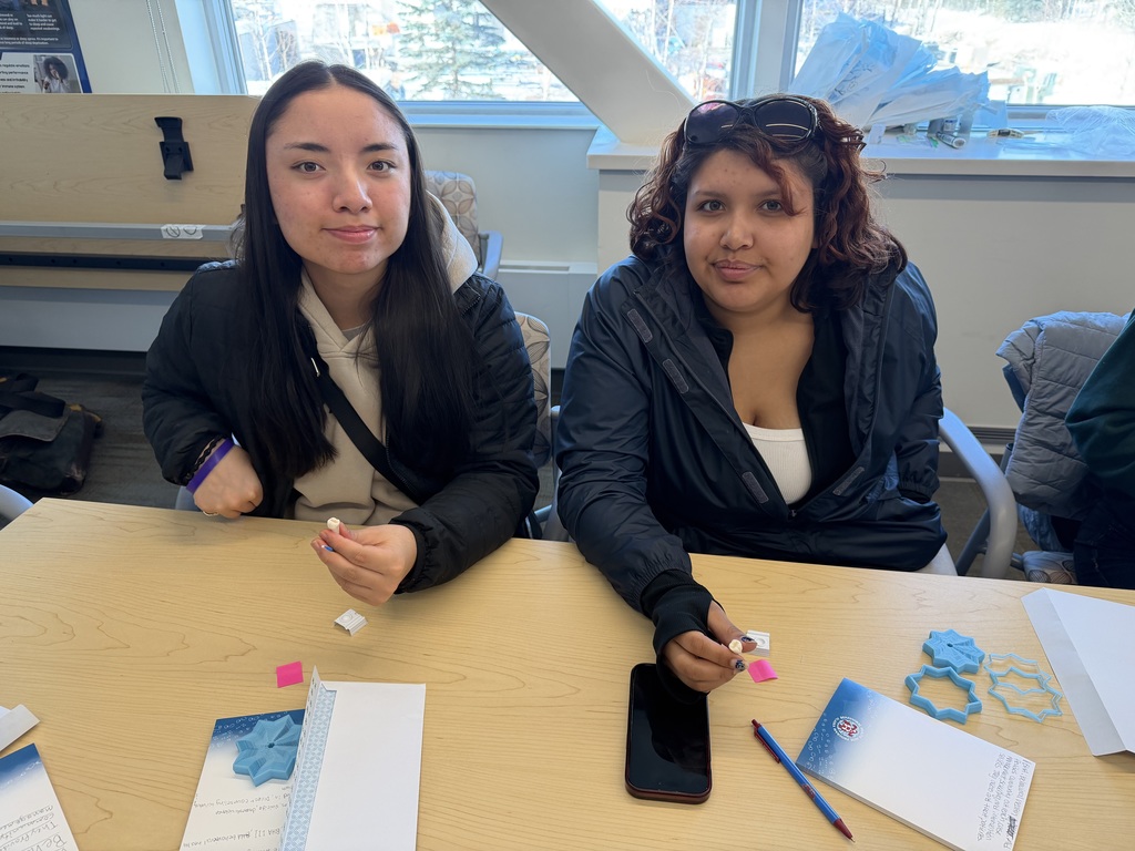 student working at a desk
