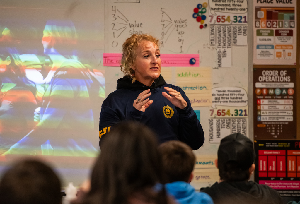 woman in front of classroom