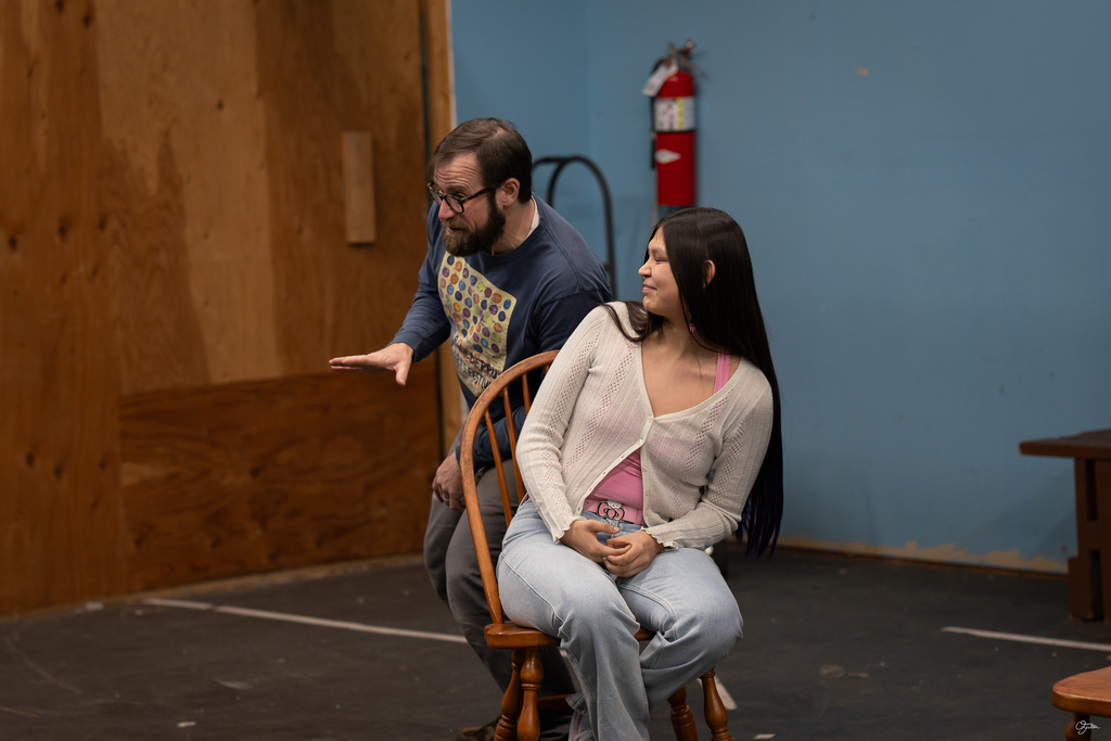 students acting in theater class