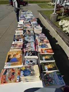 books on a table outside