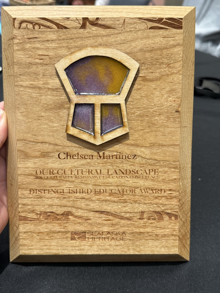 wooden award with copper shield 