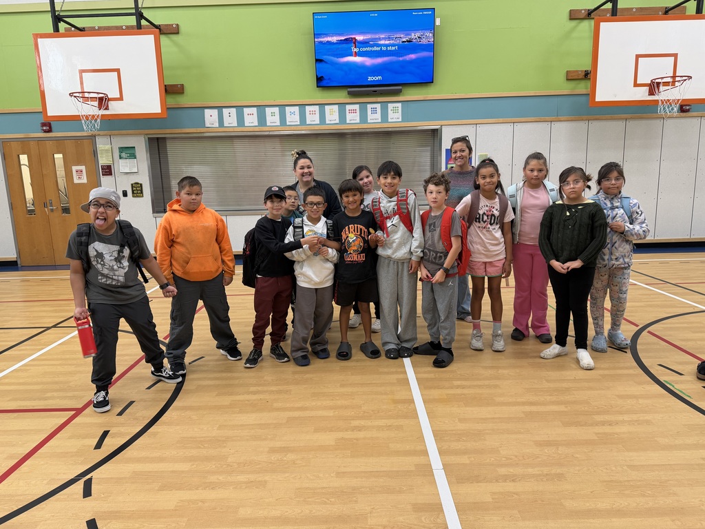 students in gym smiling