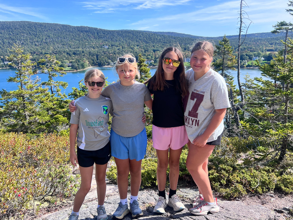 Four students on a mountain