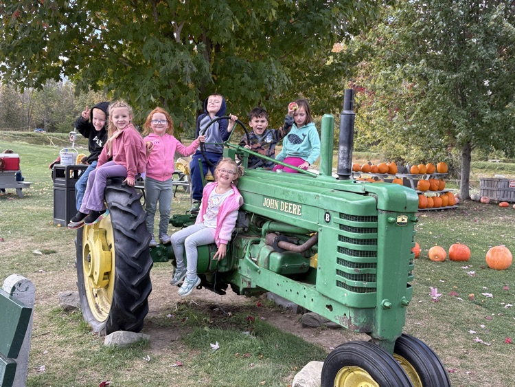 sitting on a tractor