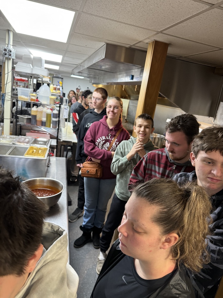Students in restaurant kitchen