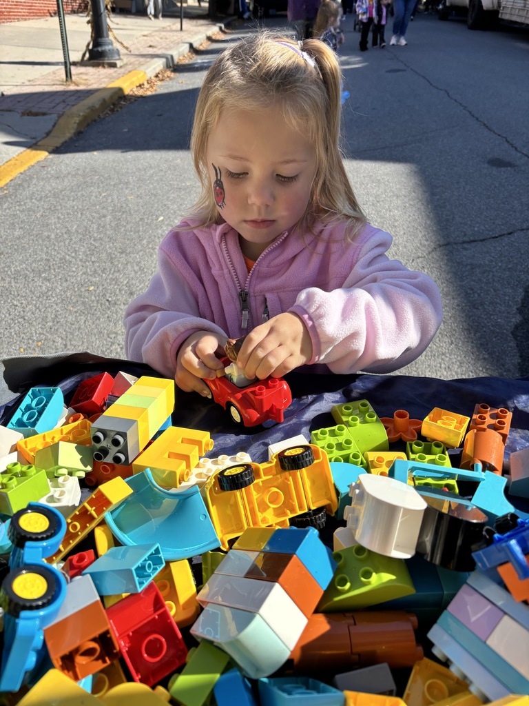 child building with blocks