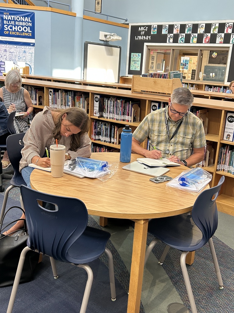 Staff writing in jouranals.