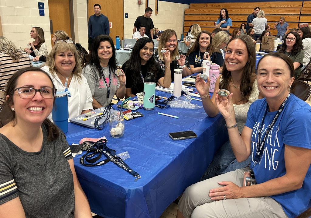 Teachers holding their rocks.