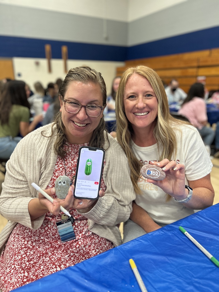 teachers showing their rocks.