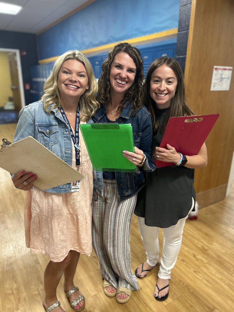 Teachers holding their clipboard
