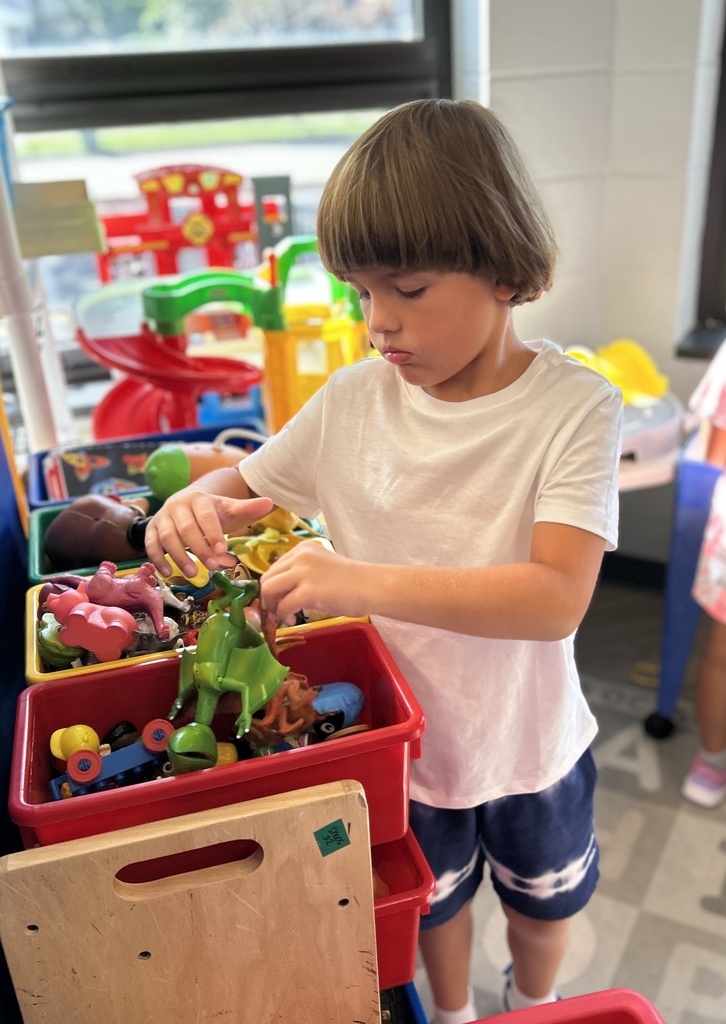 Student playing with toys.