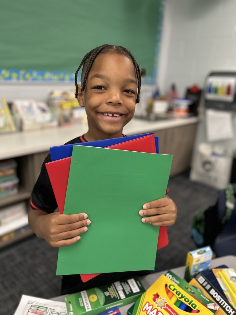 Student organizing folders.
