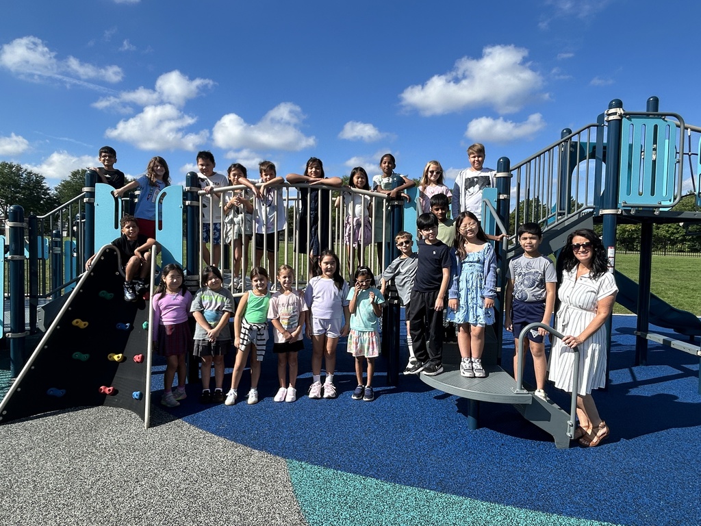 Class on the playground for a photo.