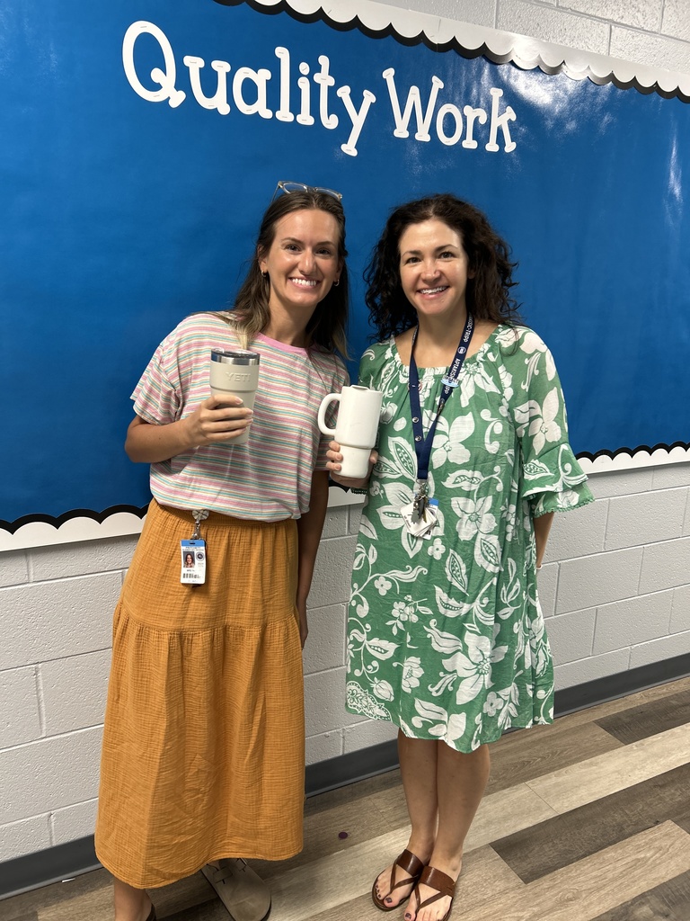 Teachers standing together.